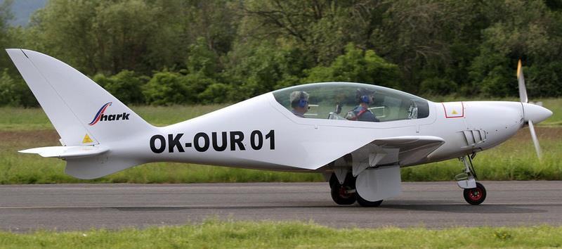 7. TECHNICAL DESCRIPTION OF THE AIRPLANE SHARK is a composite high-performance low-wing airplane with tandem seats and retractable tricycle type undercarriage, designed according to European UL and