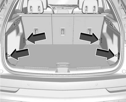 Removing the Cargo Cover To remove, disengage the cords and pull the cover out of the vehicle. The vehicle has four cargo tie-downs in the rear compartment.