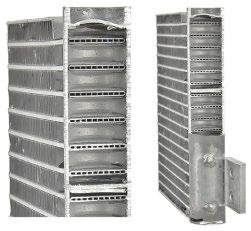 The outside airflow across the condenser fins causes the heat to be transferred to the cooler outside air.
