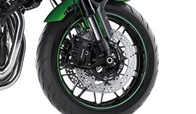 At the front, 300 mm brake discs are gripped by opposed 4- piston radial-mount monobloc calipers.