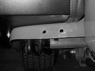 3): Dismount the springs of the drive-over safeguard Dismount the snow blade intermediate bracket (must be replaced with the intermediate bracket, see Fig. 3). Drill 2 fastening bores ø 8.5mm (Fig.