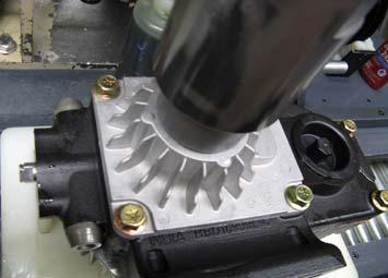 the radial bearing over the pump shaft into charge pump housing cavity