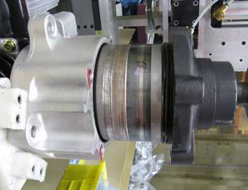 wheel motor casting over the two oil pipes.