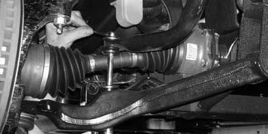 Example: Driver vs. Passenger and Front vs. Rear. Working on the driver side, slide the torsion bar back into the rear lower control arm.
