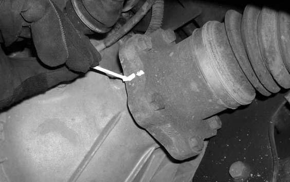 Special note: Take special care not to damage the upper control arm ball joint or rip the upper control arm ball joint