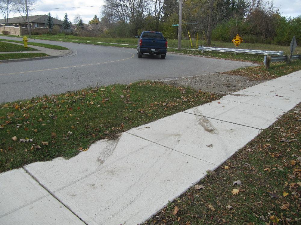 This article deals with a specific Speed Advisory tab that exists on the very sharp "curve" of Beaverbrook Road where it intersects with Proudfoot Lane in London, Ontario, as shown in Figure 1.