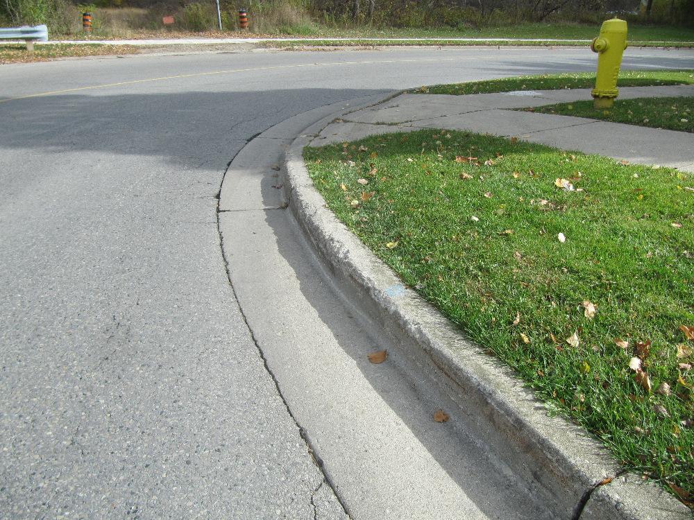 Figure 7: Evidence of scrapes and black tire marks on the edge of