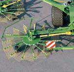 Hydraulic windrow width control allows operators to telescope the two rear rotors in or