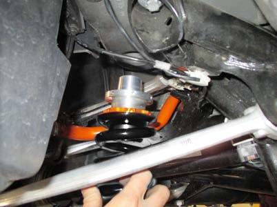 Rear coil spring & adjuster installation 1. Next install the coil spring adjuster and rear spring.