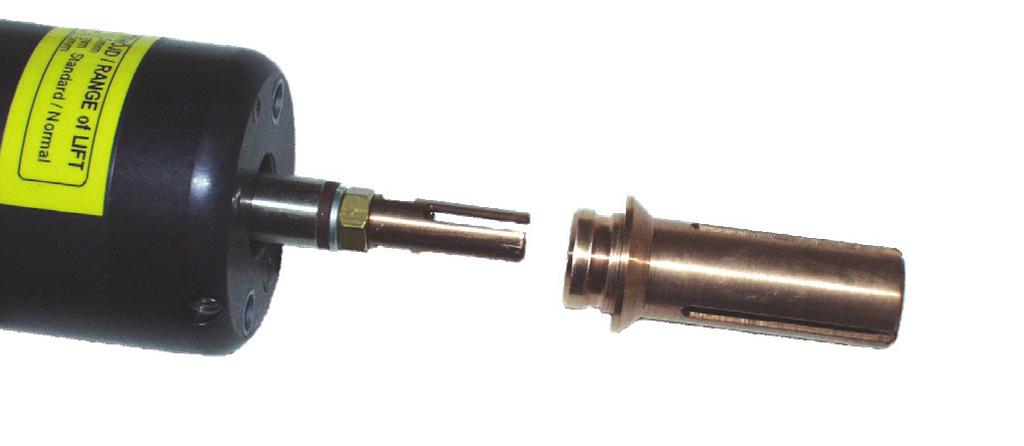 of the grounding cable. Cleaning is accomplished with a grinder to ensure clean, bare metal. b. The pin holder is threaded onto a threaded shaft in the gun and locked in place with a nut.