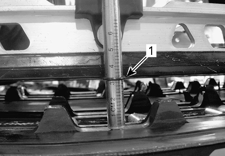 FINAL PREPARATION 1 2 A01F05A 3 mmr2009-133-002_a 1. Deflection O-ring aligned with slider shoe 12. Read load recorded by the upper O-ring on the tensiometer. mmr2009-133-003_a LOAD READING 1.