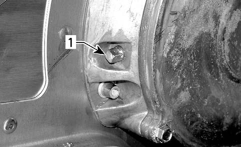 NOTE: When checking level at low temperature it may be slightly lower then the mark. Add if necessary. mmr2008-047-002_a TYPICAL 1. Check plug To add oil, remove the filler cap on chaincase cover.