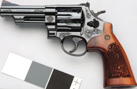 SMITH & WESSON ENGRAVING AVAILABLE FEATURES /smithwessoncorp MACHINE ENGRAVING CUSTOM ENGRAVING