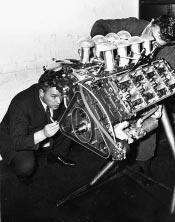 These rather ugly fabricated tin boxes and piping needed to be added to the early engines to alleviate breathing