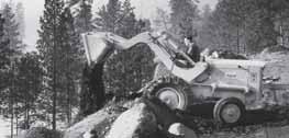1957: The fi rst factory - integrated loader/backhoe in the world: a Case industry fi rst.
