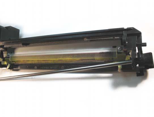 Dump the waste toner from the hopper and clean thoroughly using compressed air.