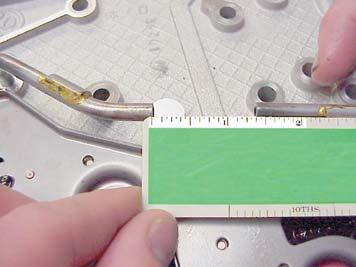Place the two modified tubes into the valve body and measure the gap between the sections.
