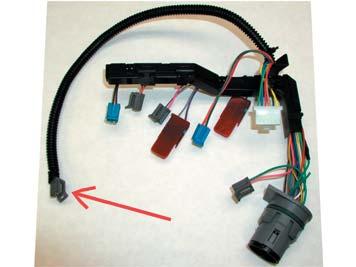 will fit 01 & later transmissions. The pigtail wrapped with wire conduit is used only on 04 & later units. For earlier units the wire (marked in picture) can be placed under the filter. (Fig.08) Fig.