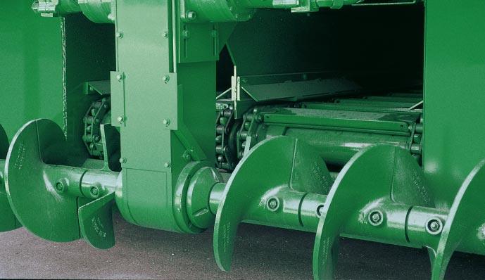 Ability to raise the auger assembly simplifies loading and unloading from a transport vehicle. Dual lift cylinders provide a stable position for the augers, enhancing mat quality.