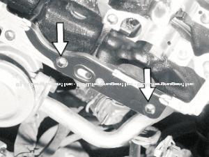 When installing cam tensioner gasket making sure it pops down over the alignment pins. (Image 8 and 9) 22) Before installing camshafts check position of marks on the chain and cams.