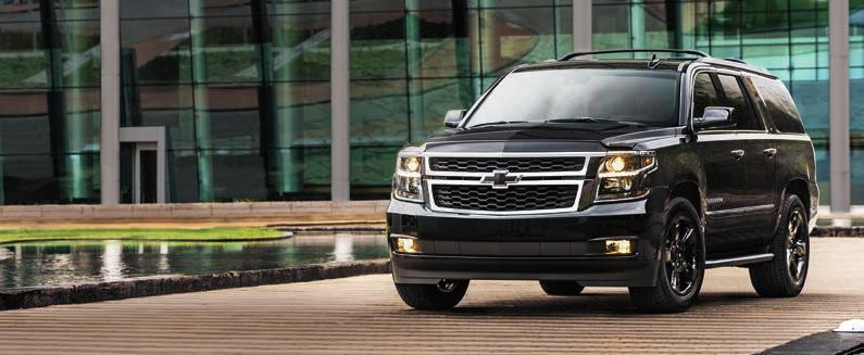 RAILS BLACK BOWTIE EMBLEMS BLACK EXTERIOR COLOR LEATHER-APPOINTED INTERIOR Suburban LT in Black with available LT Midnight Edition.