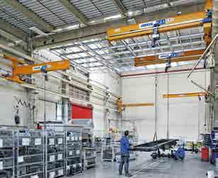 ABUS underslung travelling cranes are installed on ceiling mounted tracks rather than free standing or building columns.