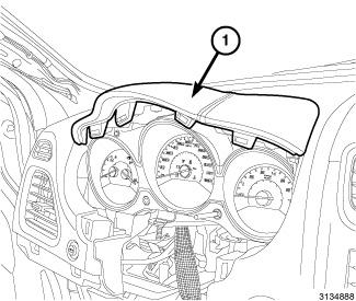 22. On vehicles so equipped, remove the fastener (2) from within the center stack opening, securing the inner lower corner of the instrument cluster hood (1)
