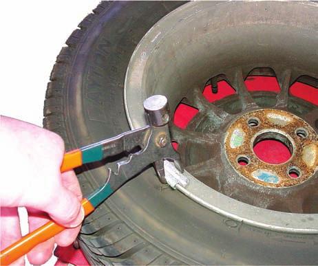 If the tire is to be patched and reinstalled without rebalancing, be sure to mark the locations of the valve stem and any wheel weights with a marking crayon.