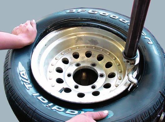 able to be stretched over the flange (Figure 62.34). Be careful not to damage a tire pressure monitor during bead installation.