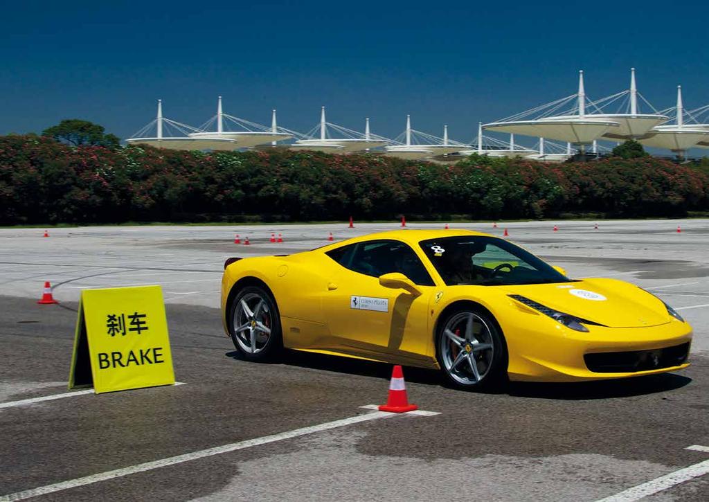 precision driving school that allows Ferrari customers and special guests to experience the performance of a Ferrari in the controlled environment of a race