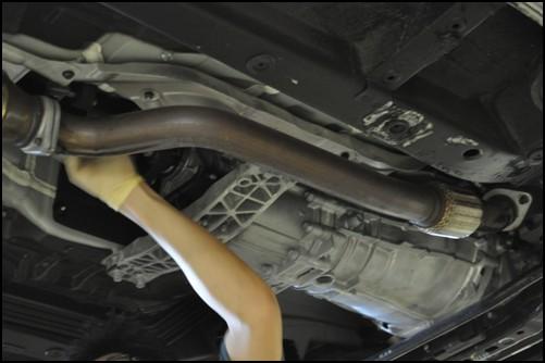 Removal of OEM exhaust system (10-12 model year shown) Optional Parts (10-12MY