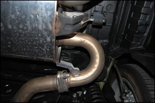 Removal of OEM exhaust system (10-12 model year shown) FIGURE 5 6.