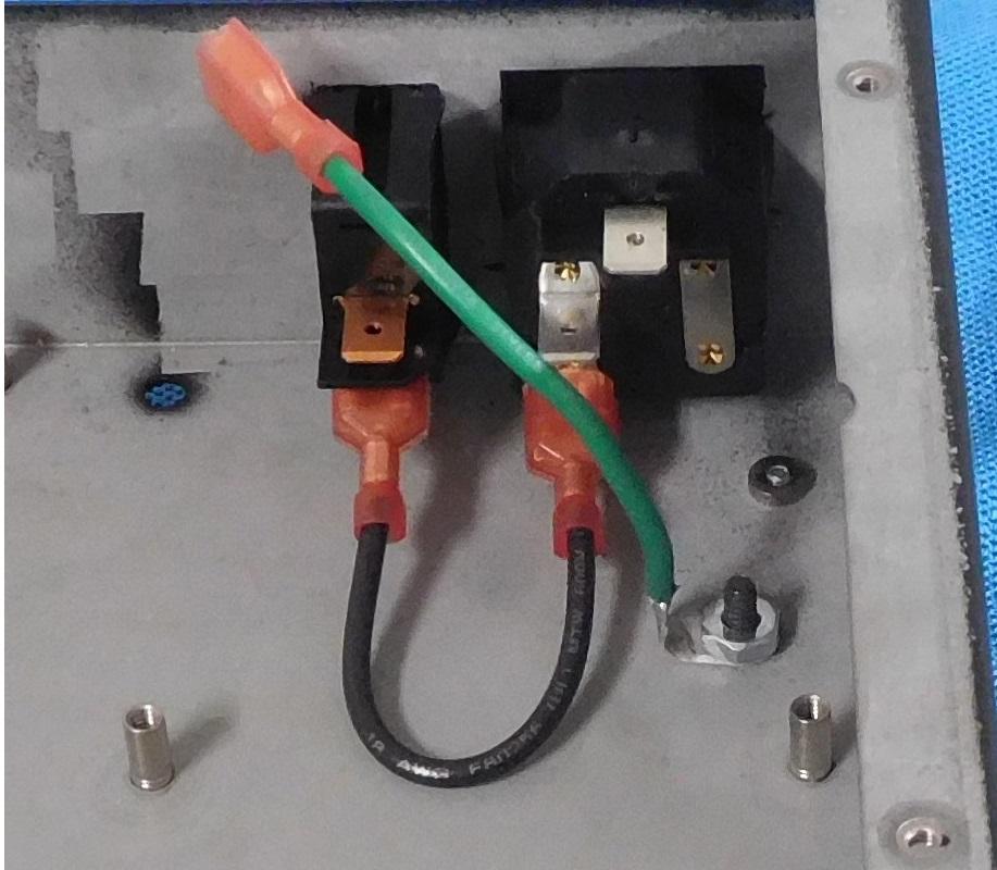 Add the black wire with FAST-ONS on both ends between the power entrance connector and switch as shown in Figure 12.