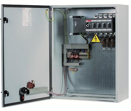 The lower side of the panel presents a removable plate for power cables connection. The front door presents an emergency push-button to stop of the generator.