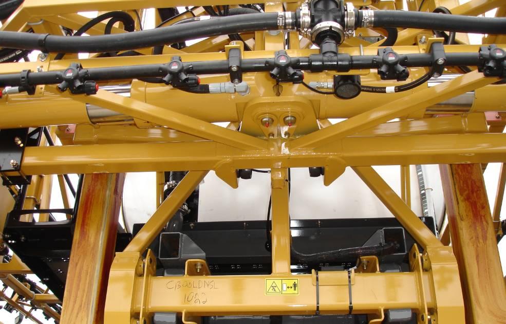 Before installing the linear roll cylinder, the factory springs, dampers and rubber bumpers must be removed from the sprayer.