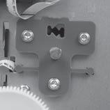 Hold the printbar in place with one hand while Inserting the printbar lock tool into the printbar lock mount.