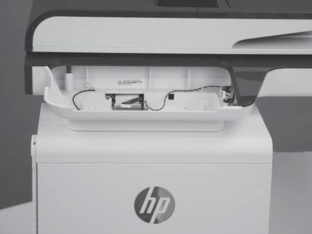 8. Move the scanner assembly toward the