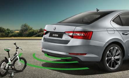 behind the vehicle, rear parking sensors make reversing into a tricky space