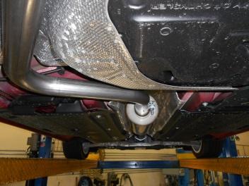 Level the muffler and support with a stand. Tighten the clamp just enough to hold, but still allow for adjustment.
