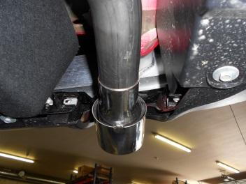 Connect the hanger on the pipe to the rubber mount on the vehicle. Tighten the clamp enough to hold, but still allow for adjustment.