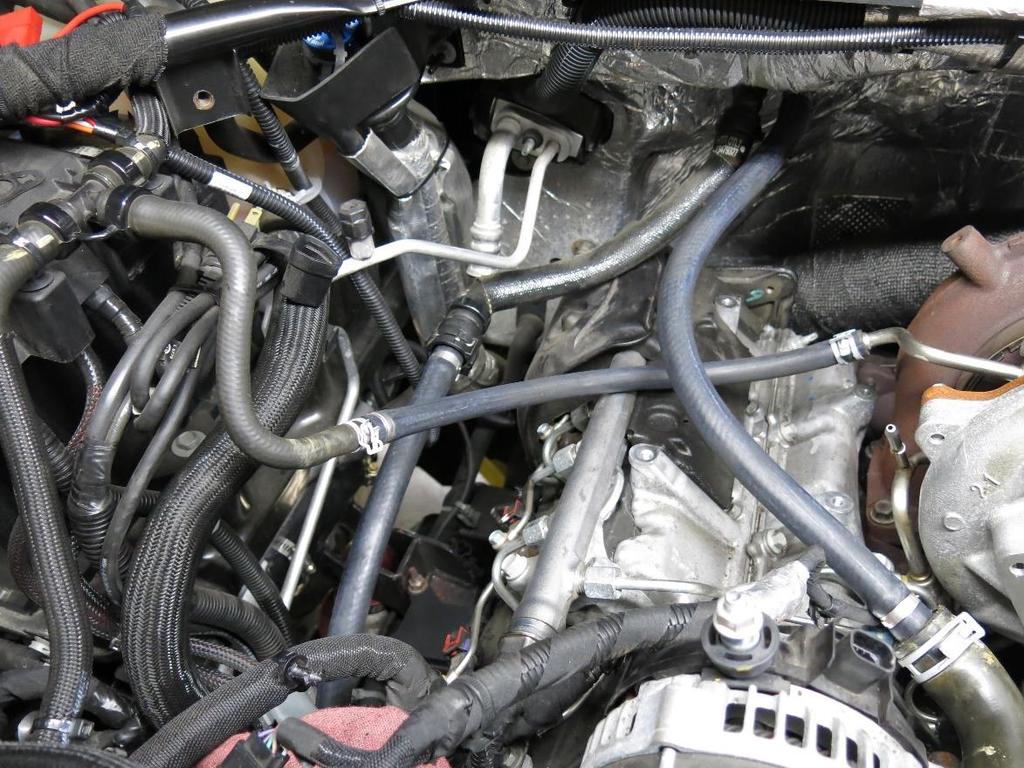 51. The supplied 15 long, 3/8 diameter coolant line (WCF100267) can be installed to the upper turbo coolant