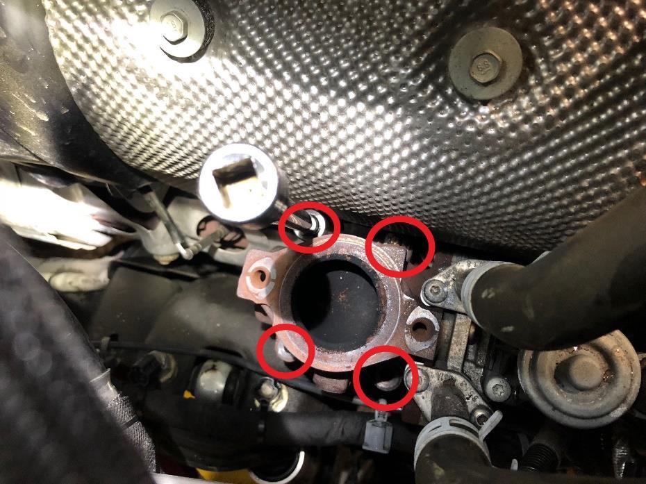19. Once the Lower EGR Valve is removed, you can install the supplied Steel Manifold block off plate (WCF202-12) with new gasket (12677819) and