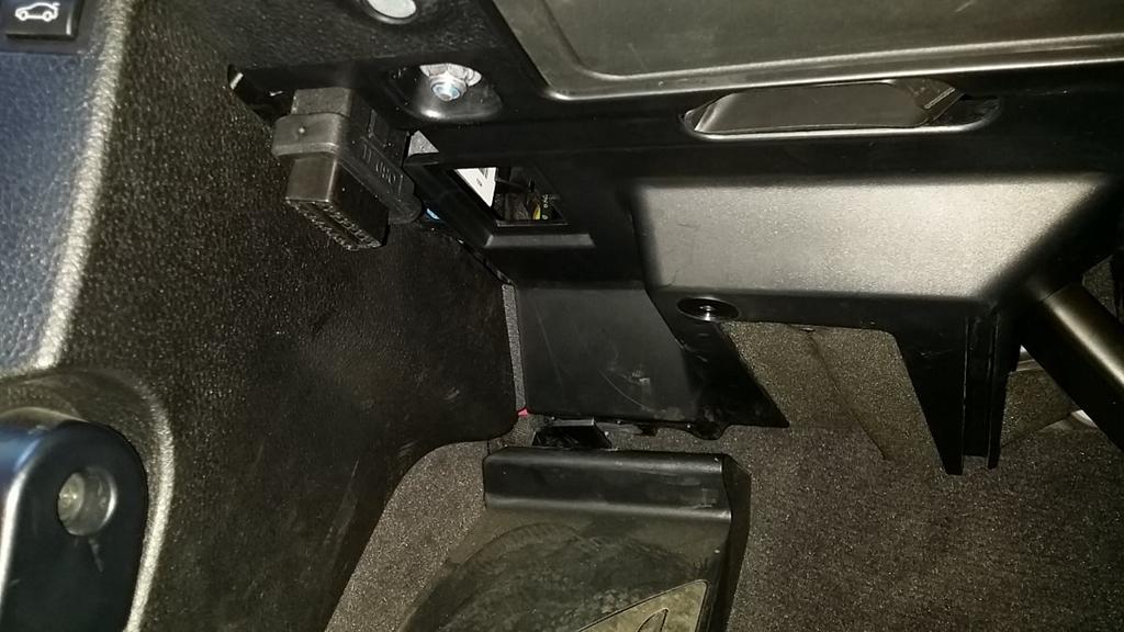 7) Reinstall the interior panel and route the OBDII connection to the OBDII plug with the wire tucked behind the panel you've reinstalled. 8) Reinstall any removed covers.