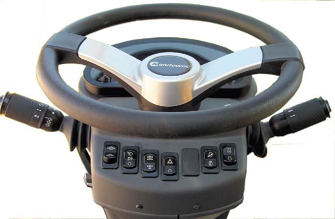 Operator s Cab (New Full Vision ) Turn-signal, wiper / washer, & horn Transmission select Steer column tilt /