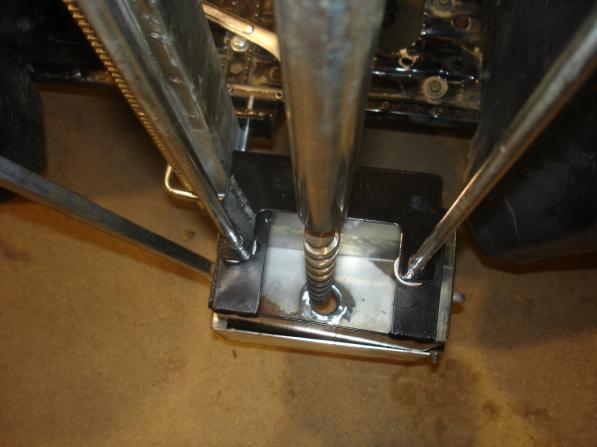 the mast at all times. [Figure 6] Note: These two bolts can also be used to tilt the power head from front to back allowing you to adjust the auger for proper alignment into the collection bucket. 2.