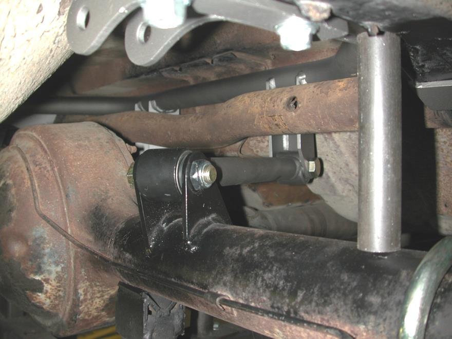 14. Bolt the axle tabs to the upper bar using a 5/8 x 2 3/4" bolt and nyloc as shown in the picture. The upper bar should measure 12 C-C. 15.