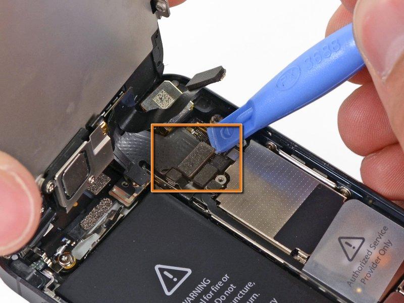 Use a plastic opening tool or a fingernail to disconnect the three front panel assembly cables: Front-facing