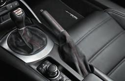This custom Parking Brake Boot dresses up the centre console in premium Alcantara material.