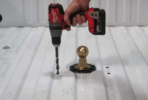 12. From the bottom side drill a pilot holes for safety chains.