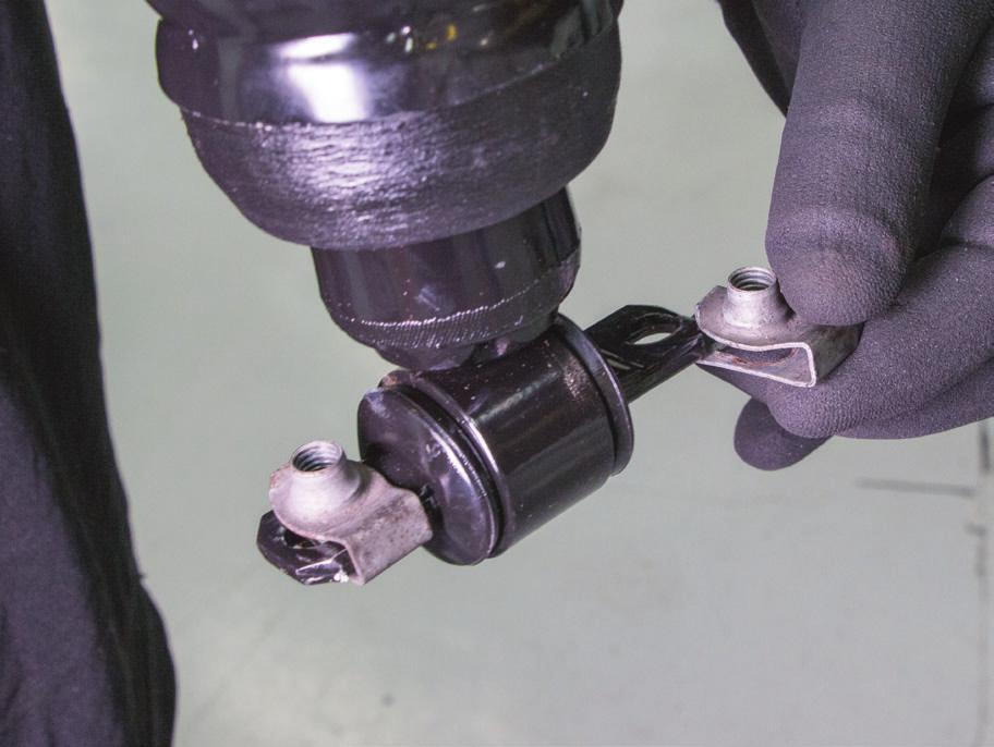 manufacturer's specifications during the installation process. Do not remove the air fitting from the air strut.